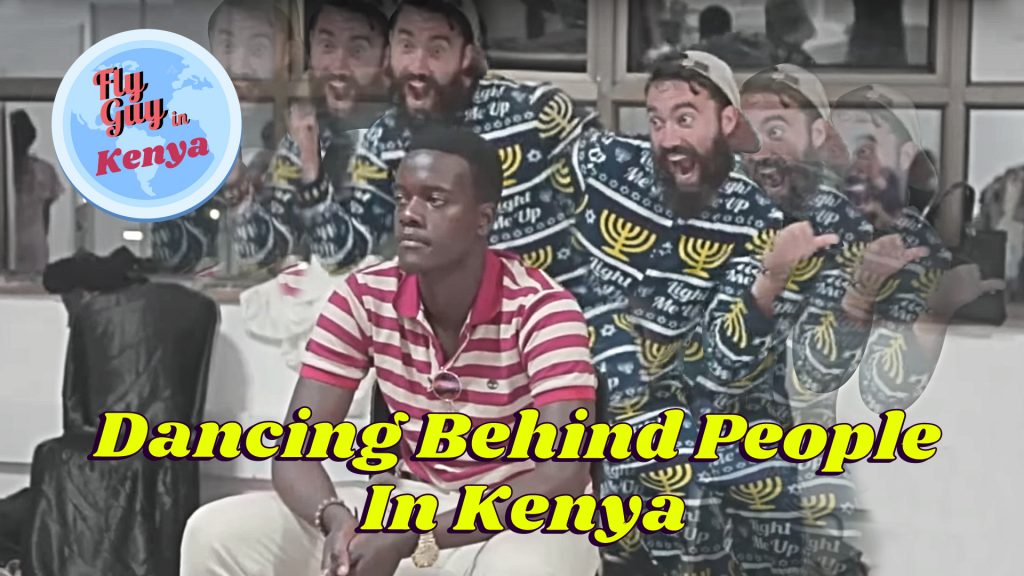 Dancing behind people in Kenya